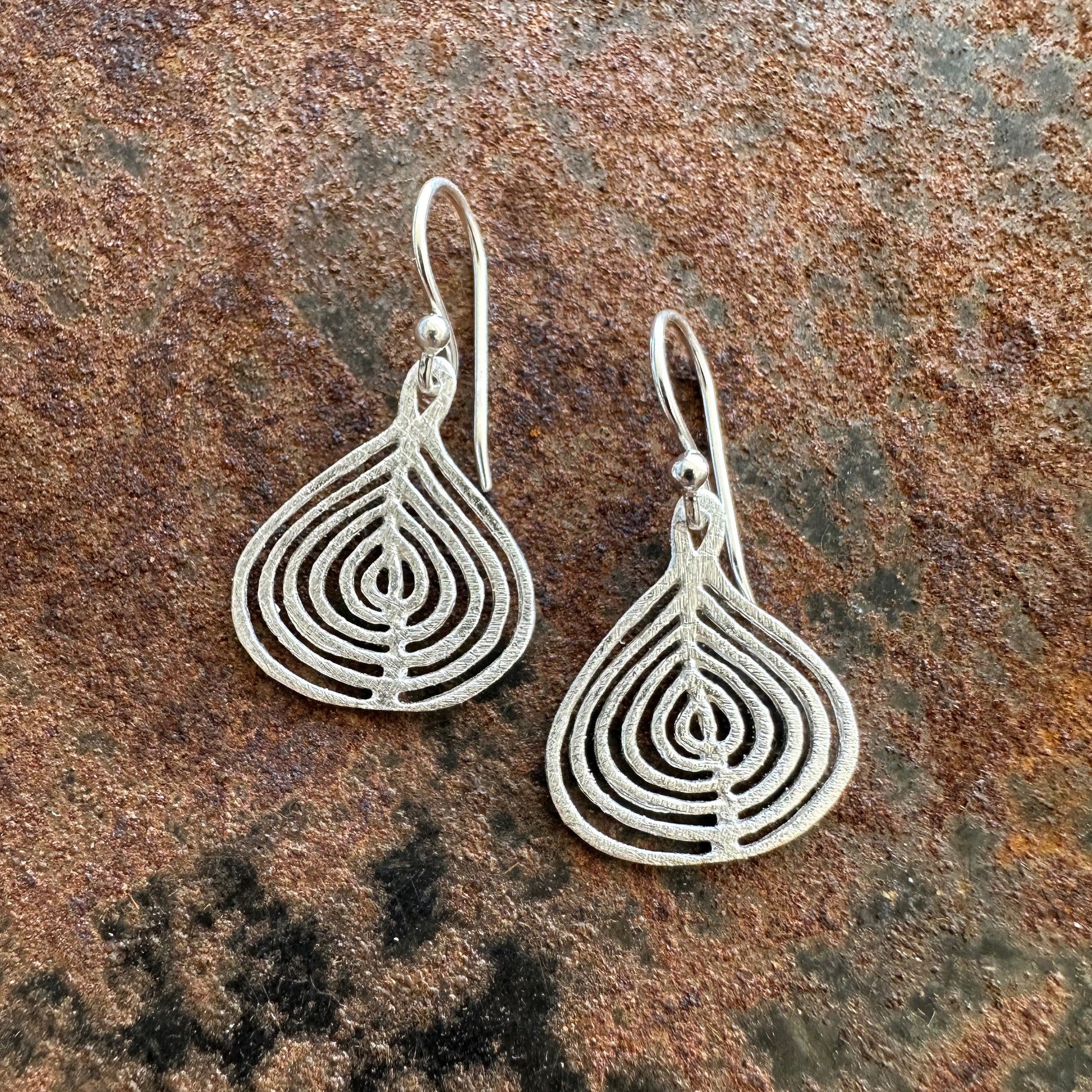 Rain Dance sterling silver tribal spiral earrings, Ancient Country Collection, Primitive Earth Australian jewellery, matte finish
